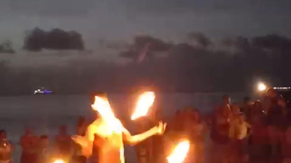 Fire dancers on the beach